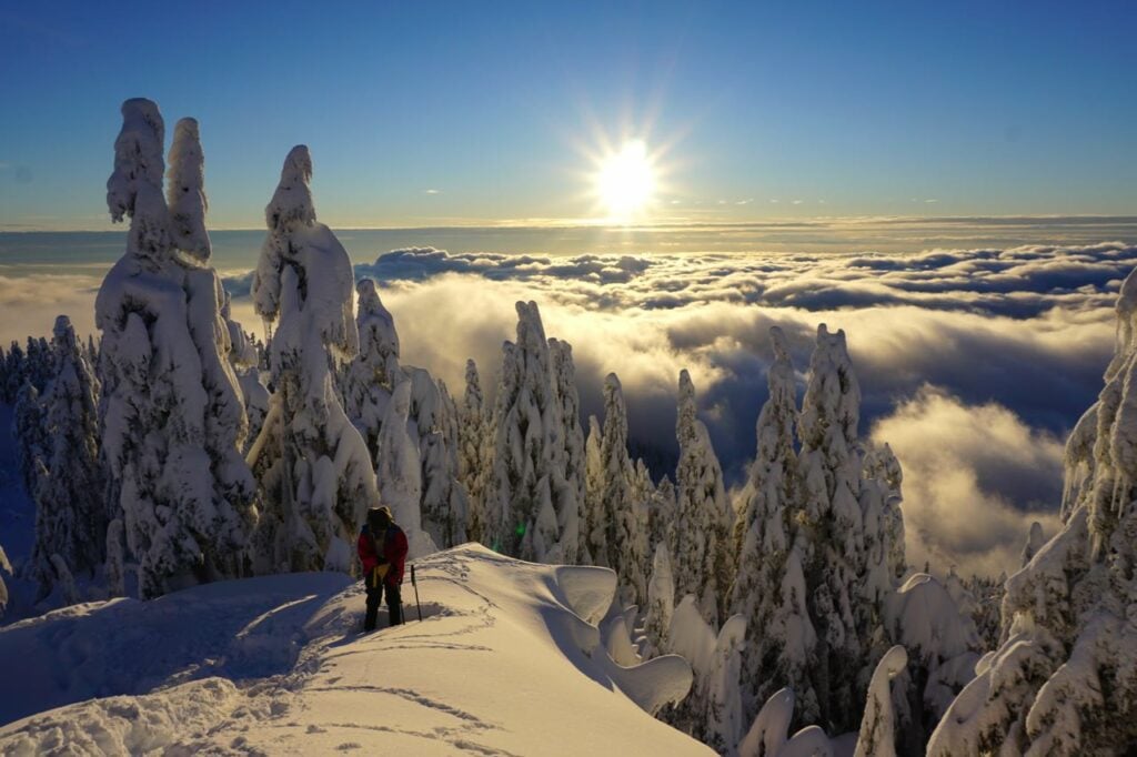 Snowshoeing on Grouse Mountain in Vancouver, BC. Find out how to have a safe and fun hike with these 8 tips for winter hiking.