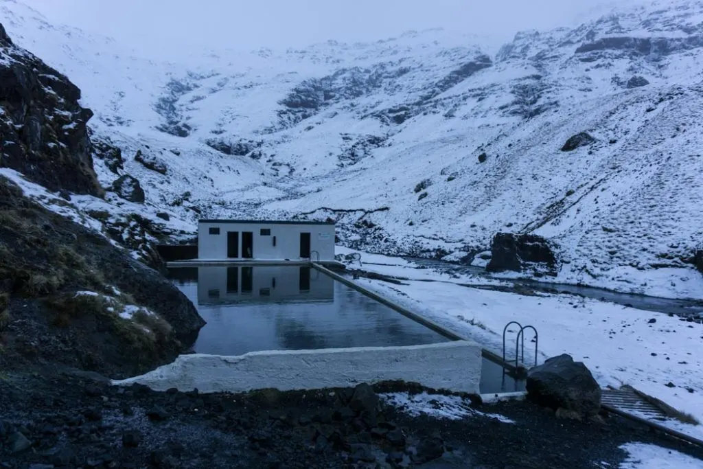 Geothermal swimming pool Seljavallalaug in winter in Iceland. A winter week in Iceland. Iceland in January. 35 Photos that will make you want to go to Iceland in winter.