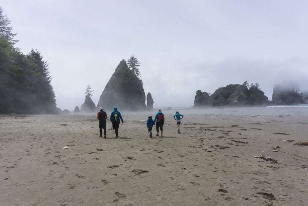 Walking through mist at Point of the Arches at Shi Shi Beach. A complete guide to hiking and camping at Shi Shi Beach.
