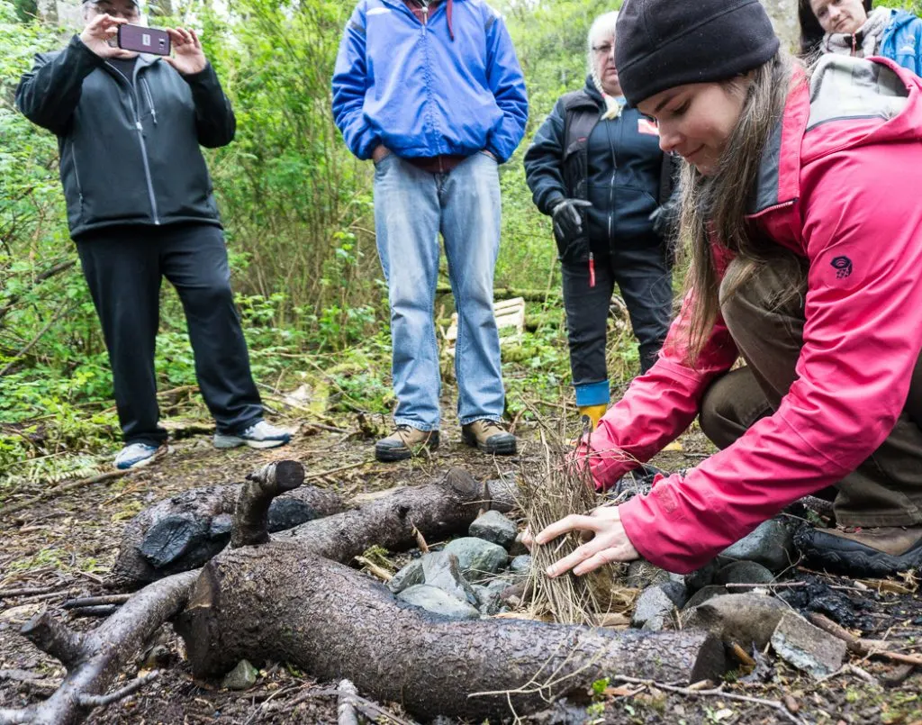 Learning to make fire in a wilderness survival course with Megan Hanacek and Carleigh Fairchild