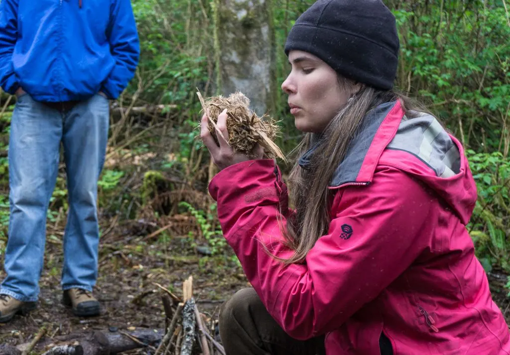 Learning to make fire in a wilderness survival course with Megan Hanacek and Carleigh Fairchild