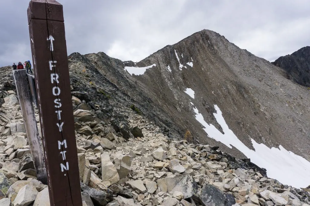 Nearing the summit of Frosty Mountain. Hike to the gorgeous Frosty Mountain larches in British Columbia, Canada. Go hiking in the fall to the see the larch trees change colour in Manning Park, BC, Canada.