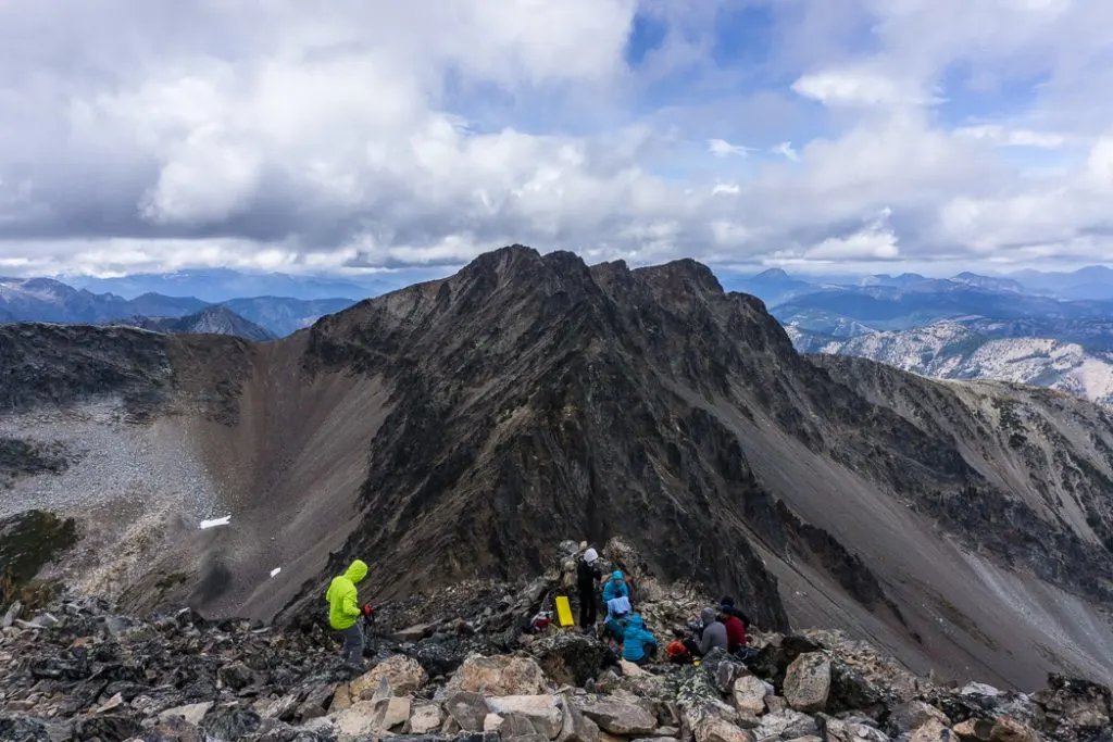 The summit of Frosty Mountain. Hike to the gorgeous Frosty Mountain larches in British Columbia, Canada. Go hiking in the fall to the see the larch trees change colour in Manning Park, BC, Canada.