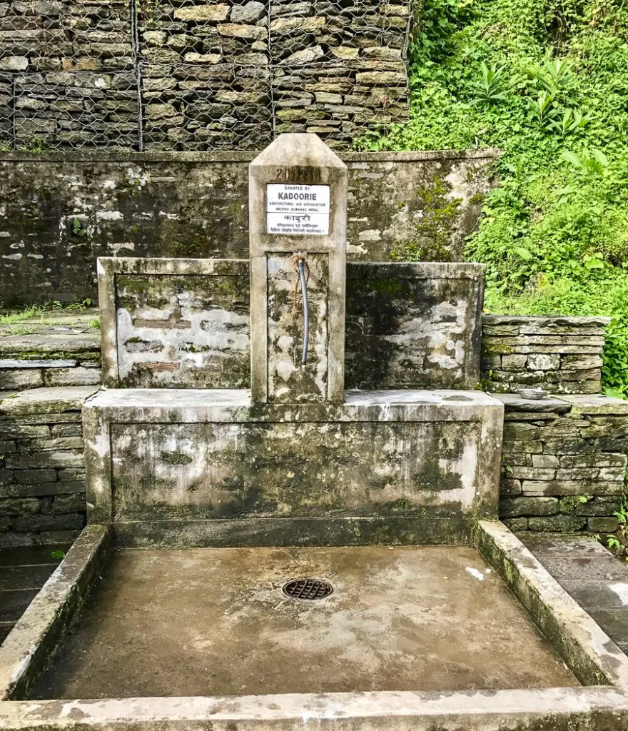 A communal water tap on the Annapurna Sanctuary Trek. 8 things I wish I knew before going trekking in Nepal.