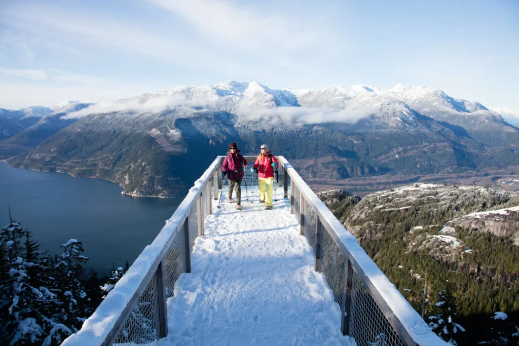 Snowshoeing at the Chief Viewing Platform on the Panorama Trail at the Sea to Sky Gondola in Squamish, BC. The Ultimate Guide to Snowshoeing in Squamish.