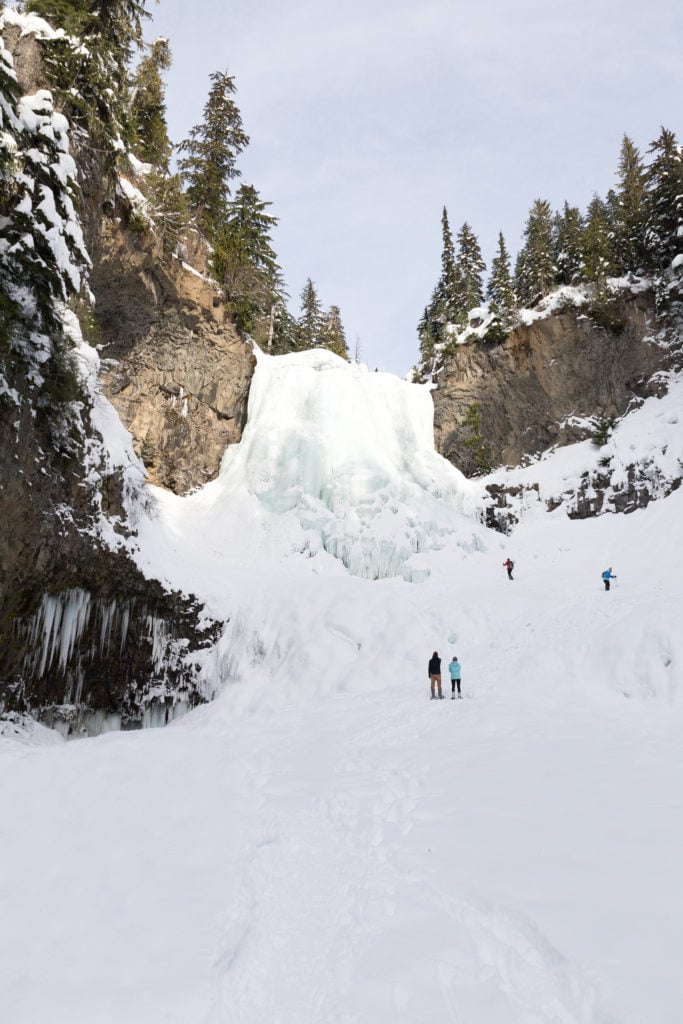 Alexander Falls in the Callaghan Valley near Whistler. Find out how to snowshoe here in the Ultimate Guide to Snowshoeing in Whistler, BC, Canada.