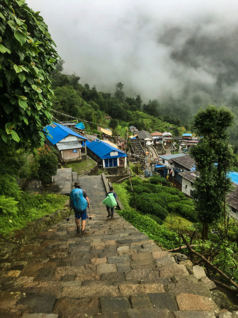 Trekking through the Gurung village of Chomrong on the Annapurna Base Camp Trek. What to pack for the Annapurna Base Camp Trek in Nepal.