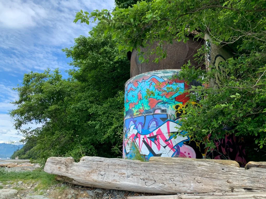 A graffiti-covered WWII defences at Tower Beach in Vancouver