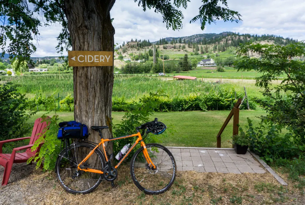 Cidery sign near Dominion Cider Co. in Summerland. Explore Summerland's wineries by bike with this self-guided tour.