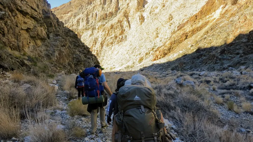 Hiking in Death Valley, California. Get tips for hiking in the desert including what gear you need, what to wear and how to stay safe.