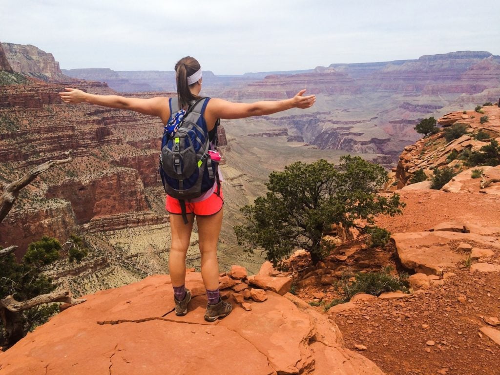 Hiking in the Grand Canyon. Get tips for hiking in the desert including what gear you need, what to wear and how to stay safe.