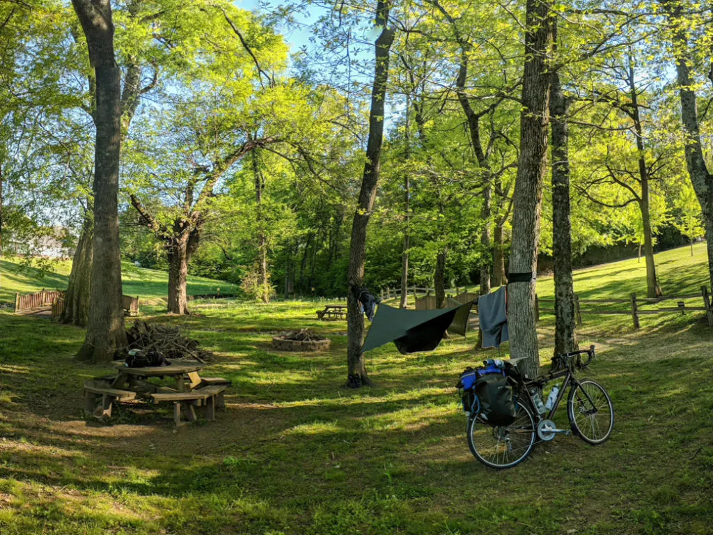 Camping at the town park in Collinwood, TN on a bike tour of the Natchez Trace. Learn how to cycle tour the Natchez Trace Parkway in this detailed guide.
