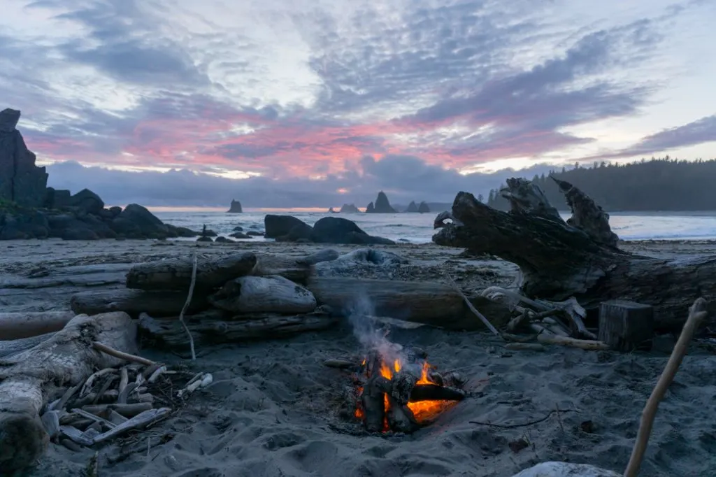 A campfire at sunset near Toleak Point in Olympic National Park