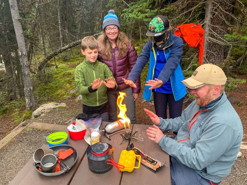 A group of campers cooking at the Lake O'Hara campground in Yoho National Park
