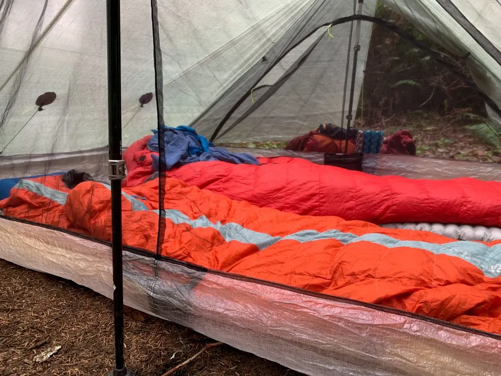 Sleeping bags set up inside a tent on the West Coast Trail