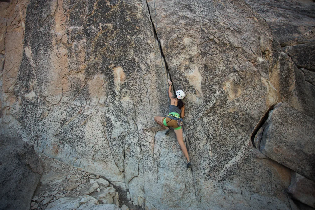 A woman rock climbing