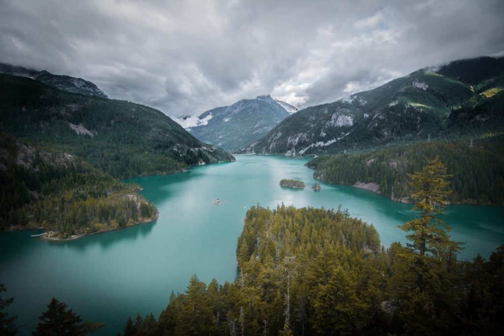 The turquoise waters of Diablo Lake surrounded by mountains in North Cascades National Park in Washington