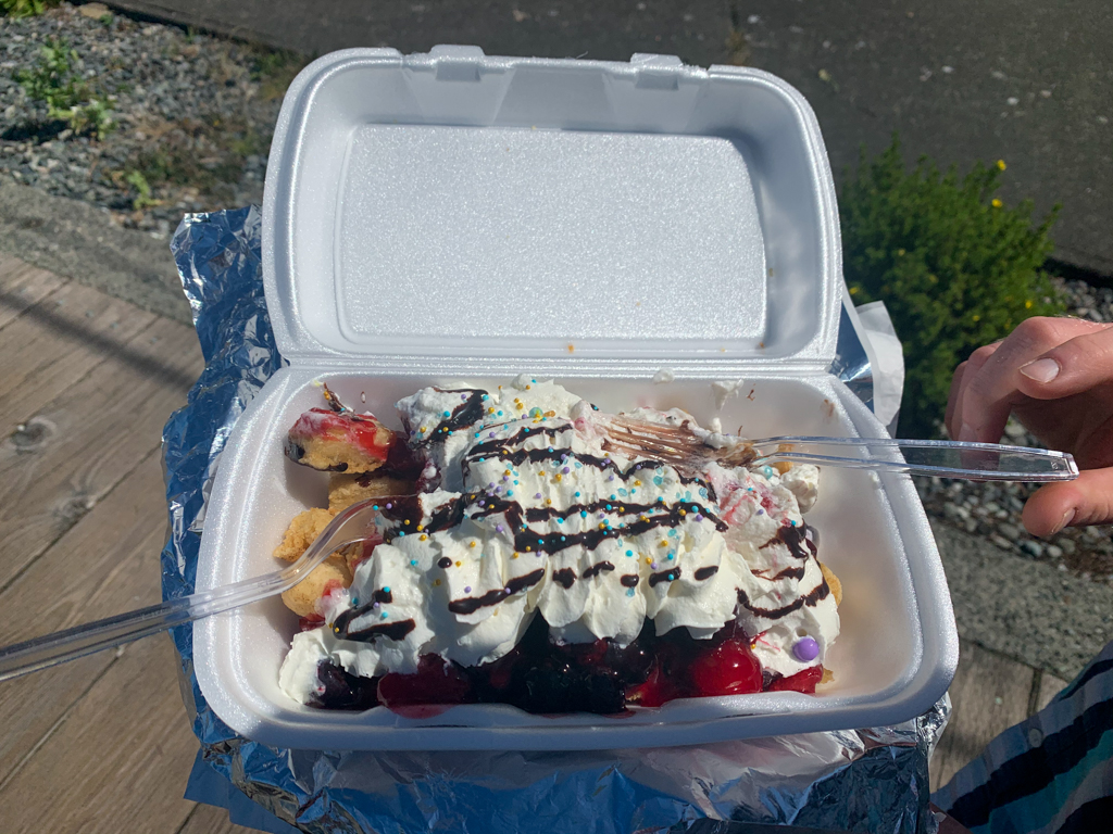 A dish of bannock fry bread with berries and whip cream from Duchess' Bannock in Alert Bay, BC