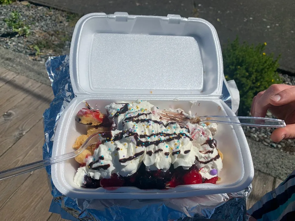 A dish of bannock fry bread with berries and whip cream from Duchess' Bannock in Alert Bay, BC