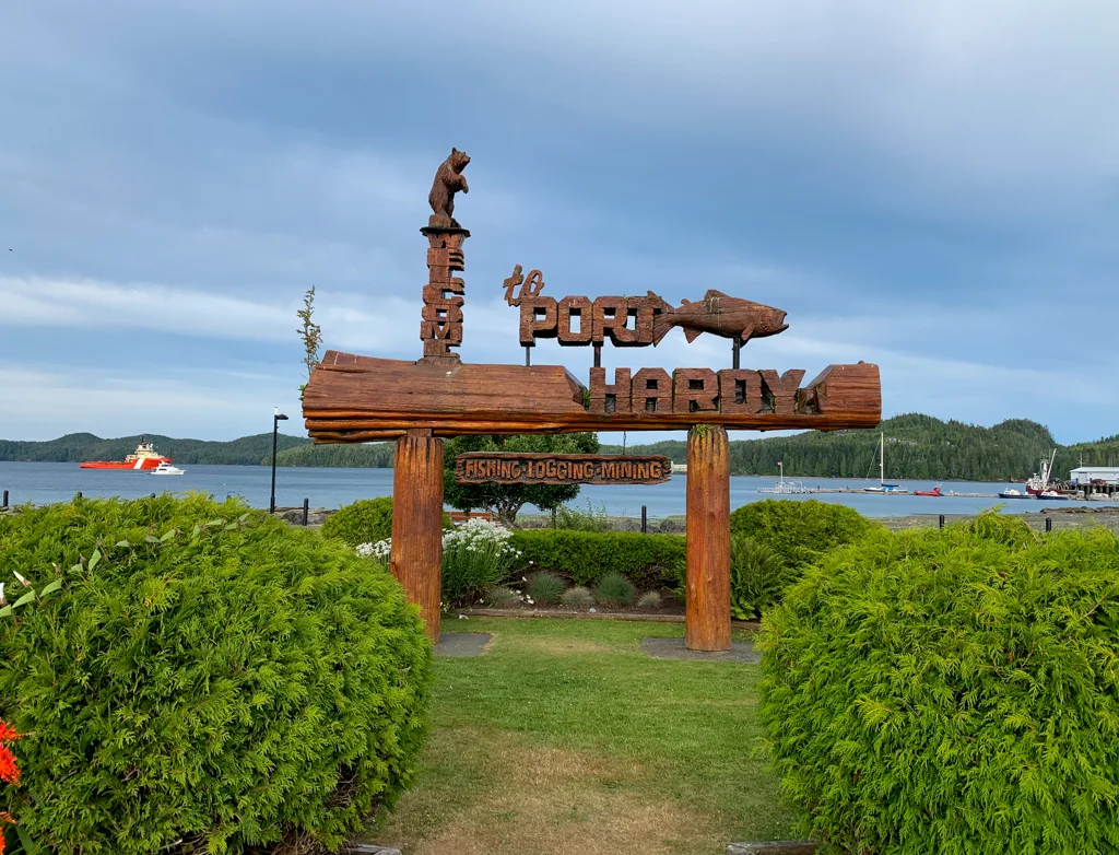 Carved wooden Welcome to Port Hardy sign at the waterfront in Port Hardy, BC