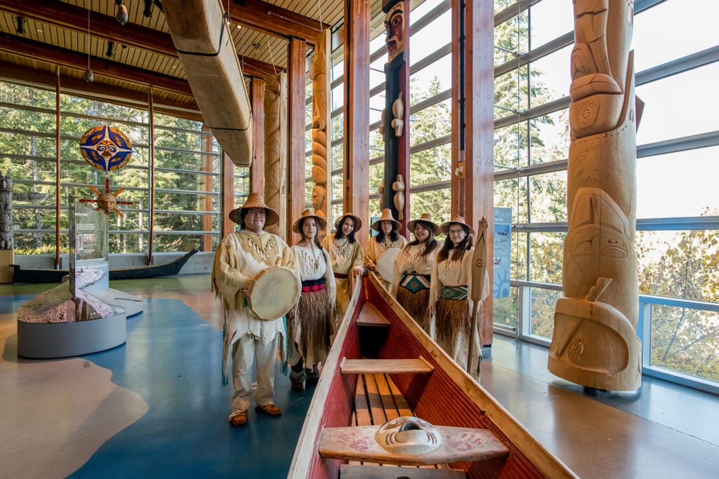 Cedar canoe and indigenous guides at the Squamish Lil'wat Cultural Centre