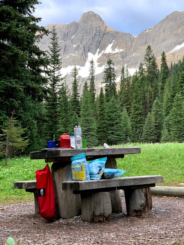 Camp kitchen gear on a table at Tumbling Creek camp on the Rockwall Trail