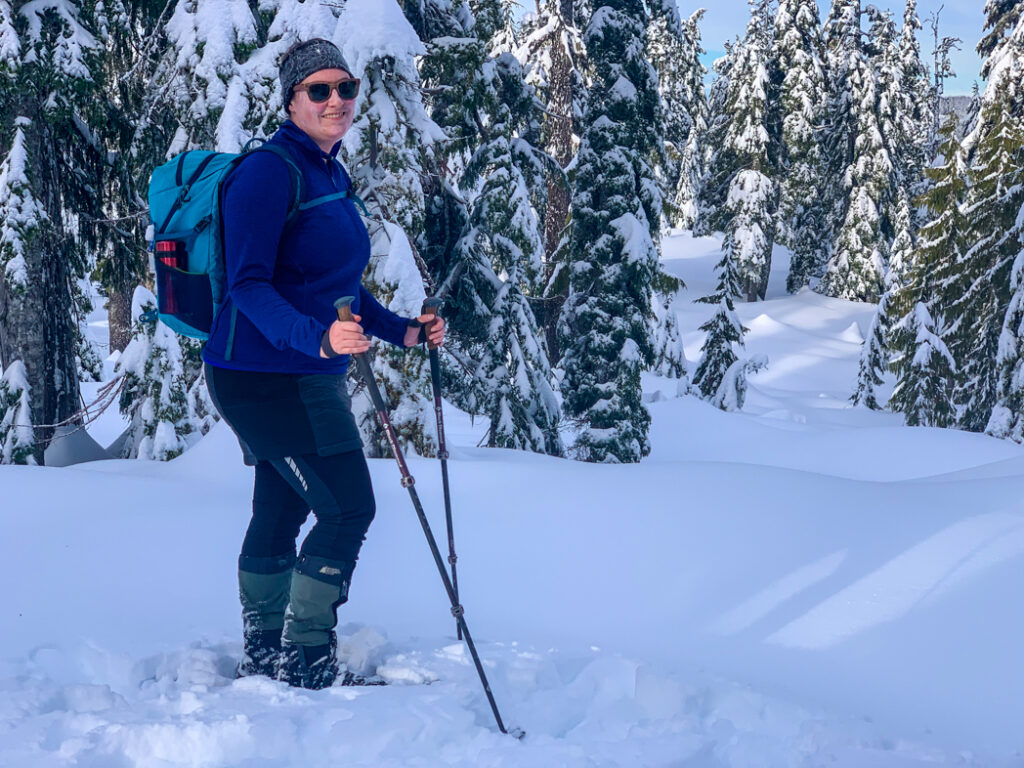 A female snowshoer wearing winter tights and an insulated skirt.