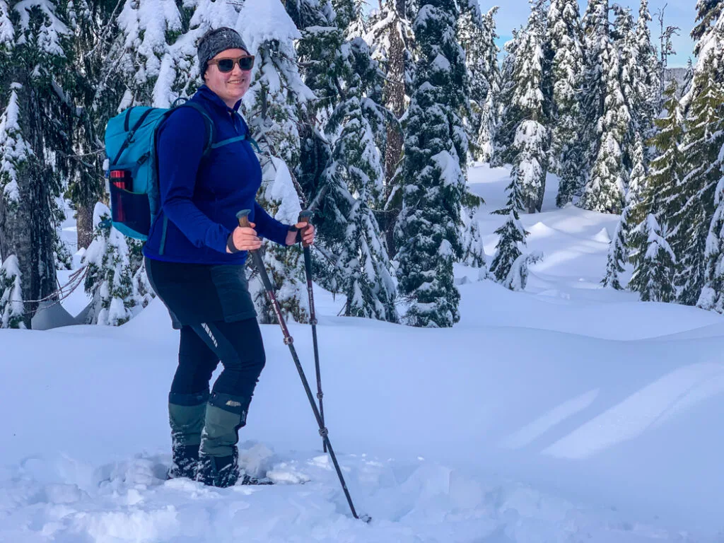 A woman on snowshoes wearing an insulated skirt