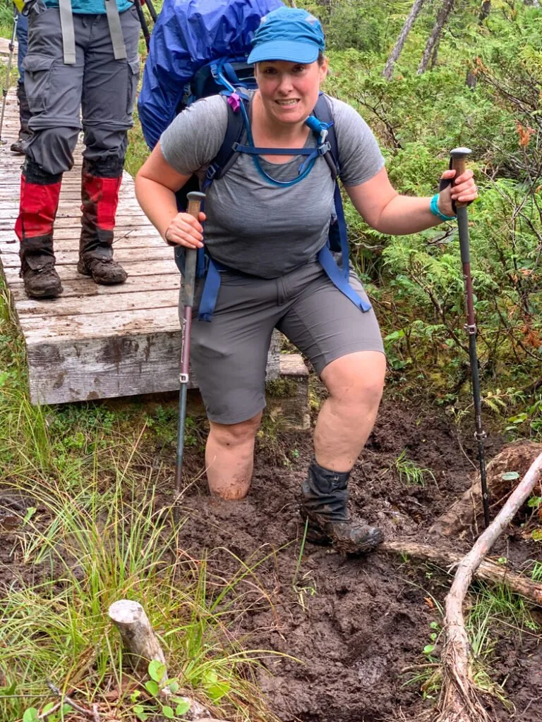 Hiker falling into the mud on the North Coast Trail
