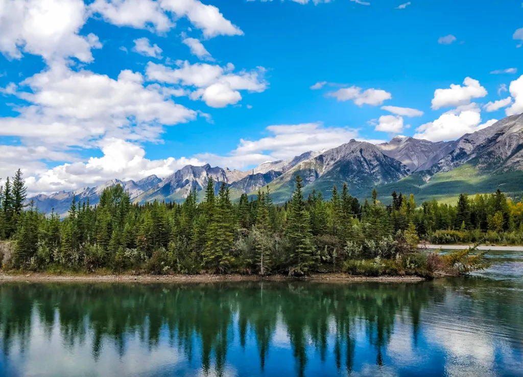 View of the Bow River from the Spur Line Trail near Canmore Alberta - one of the best small towns in Canada for outdoor adventures