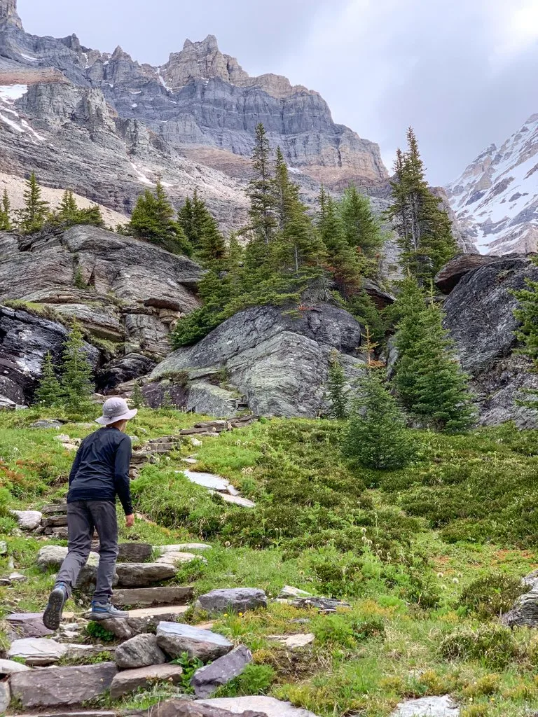 A boy hiking at Lake O'Hara in Yoho National Park