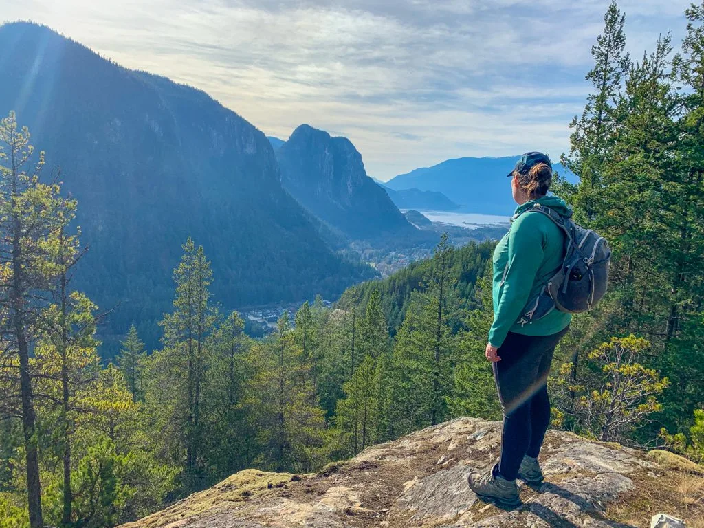 A hiker at the summit of Mount Crumpit