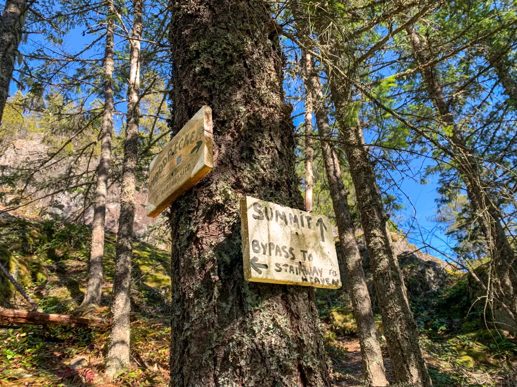 Signs at the Stairway to Heaven junction on Mount Crumpit