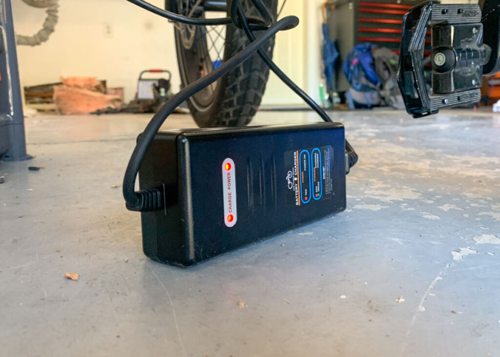 Rad Power bike battery charger in use
