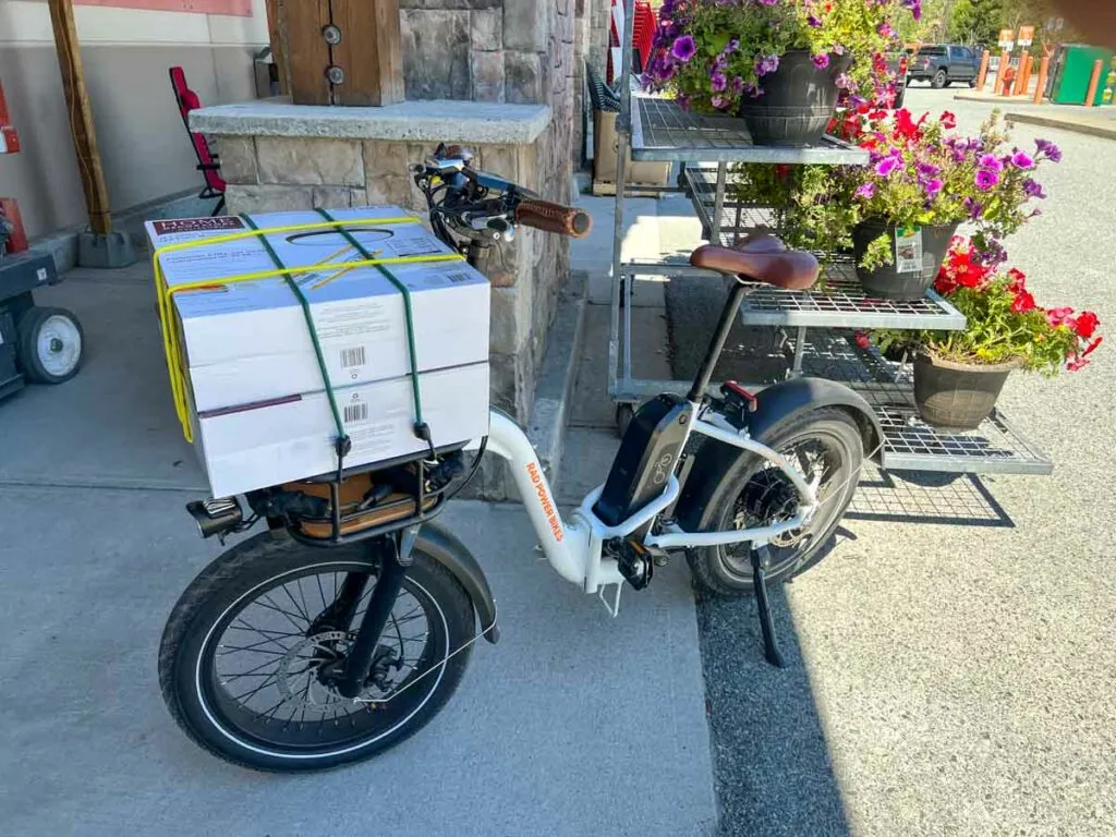 Rad Power bike front rack loaded up with cargo