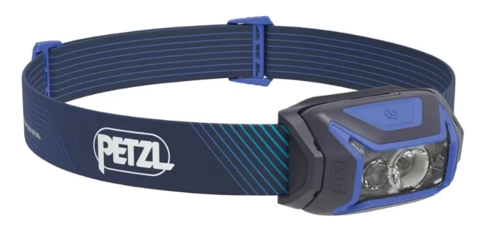 A blue Petzl Actik Core Headlamp - a great gift idea for snowshoers