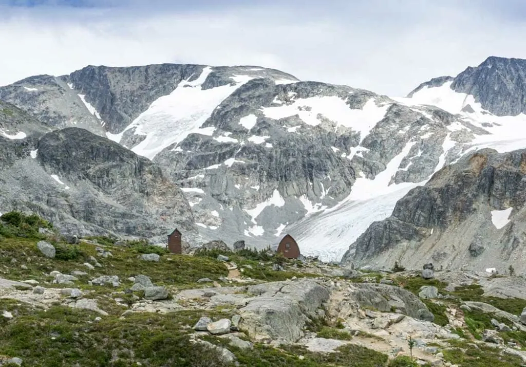Wedgemount Lake Hut with glaciers in the background