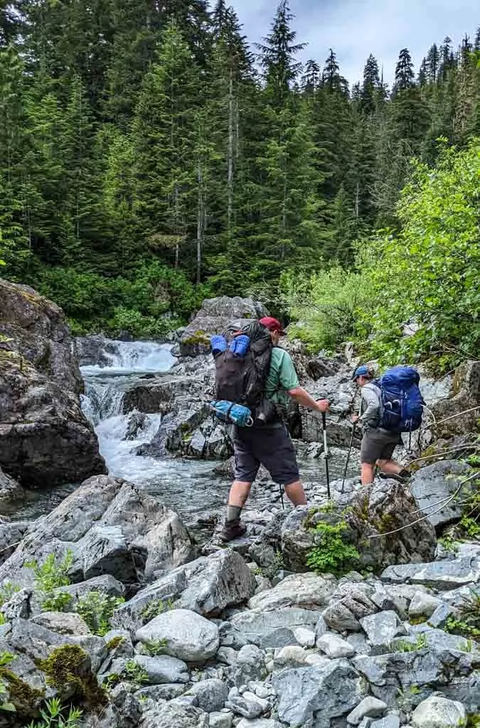 Hikers on the Della Falls Trail