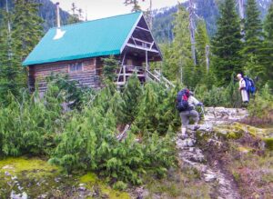 Backpackers at Edwards Lake Cabin in Tetrahedron Provincial Park