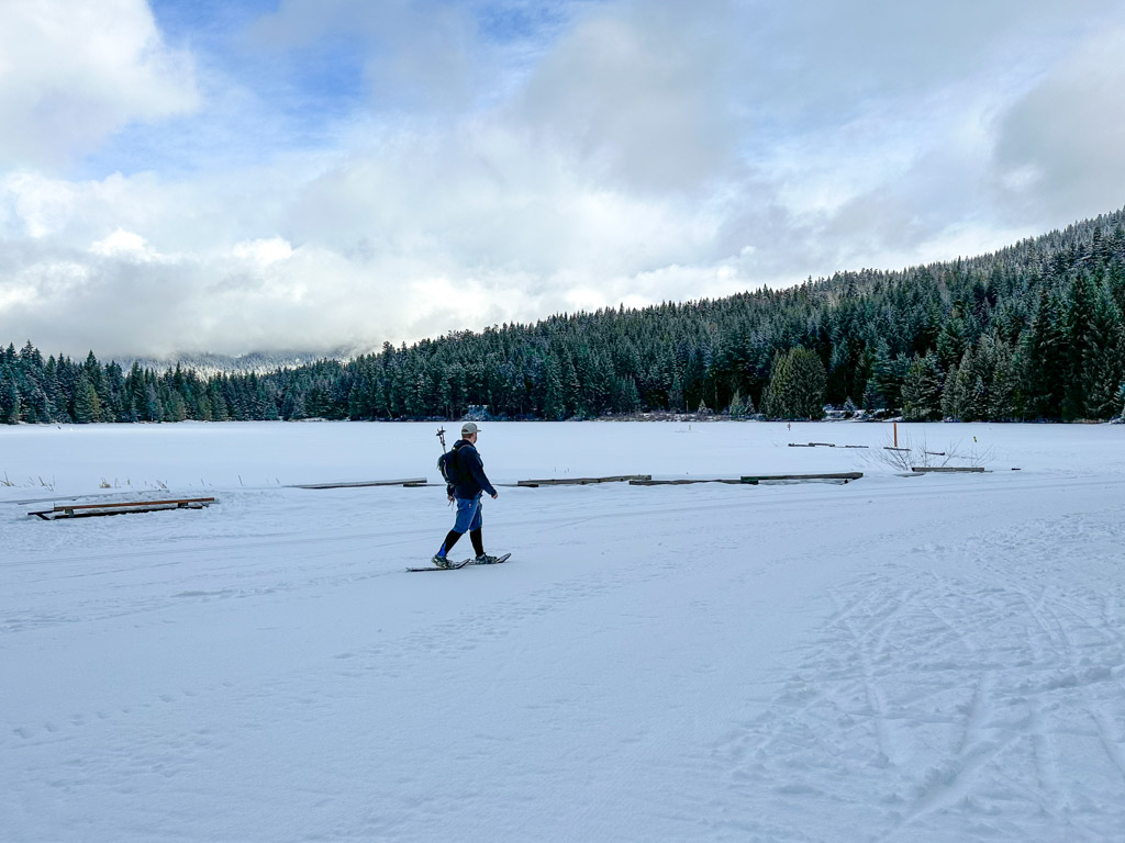 A snowshoer at Lost Lake in Whistler