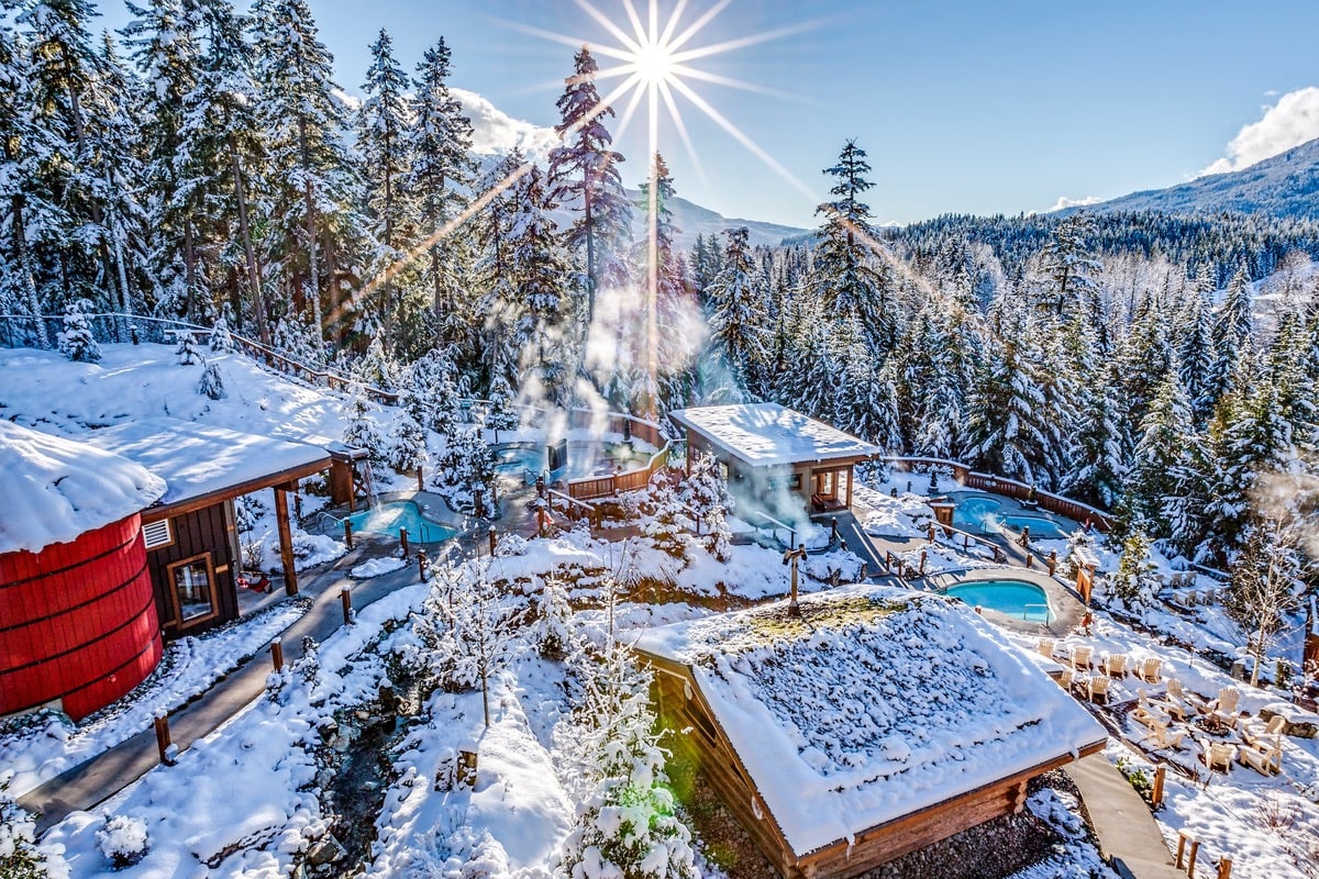 The exterior of the Scandinave Spa in Whistler in winter