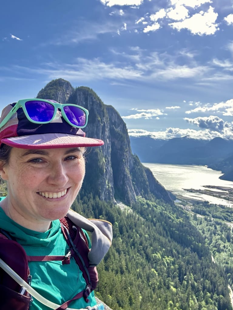 A hiker takes a selfie at Slhanay Viewpoint in Squamish
