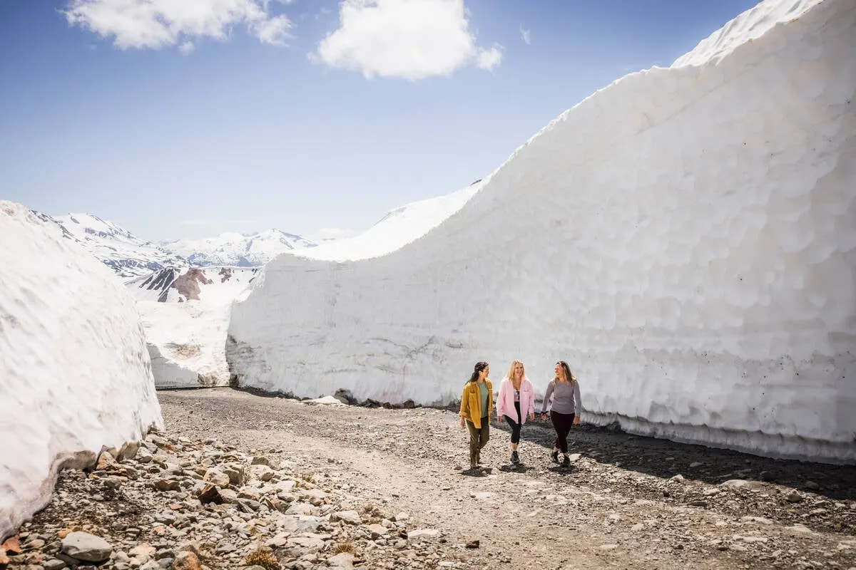 Hiking between snow walls on Whistler Mountain