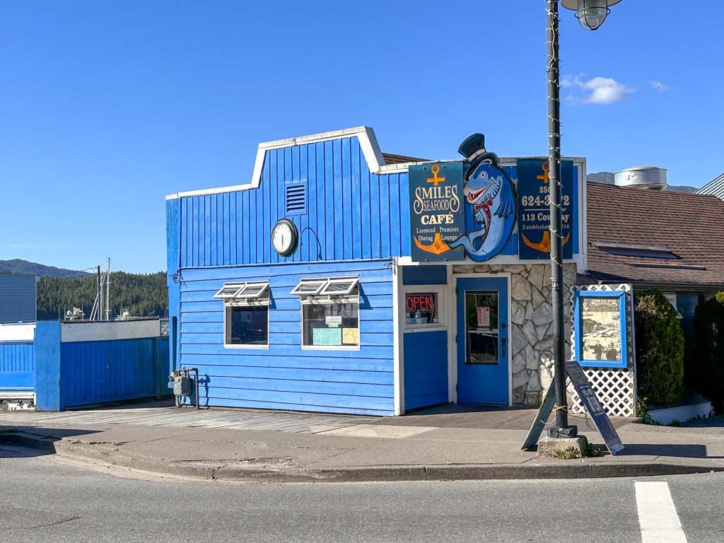 The blue-painted exterior of Smile's Seafood in the Cow Bay area of Prince Rupert, BC