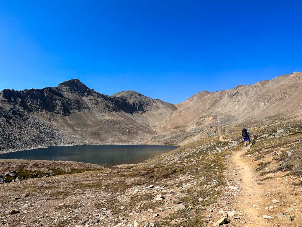 A hiker near Curator Lake in Jasper National Park