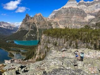 Two hikers on the All Soul's Route on Lake O'Hara Alpine Circuit in Yoho National Park