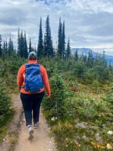 Taryn wearing a Helly Hansen Daybreaker Fleece on the alpine trails at Blackcomb