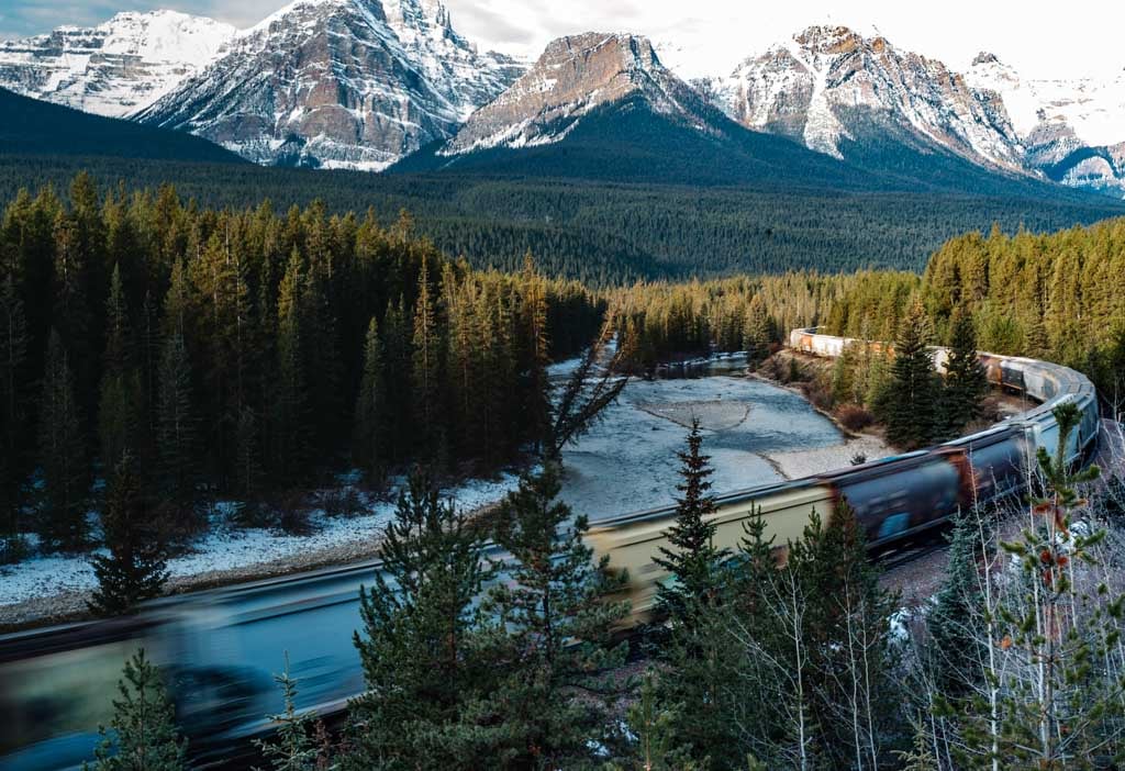 A train passing Morant's Curve in Banff