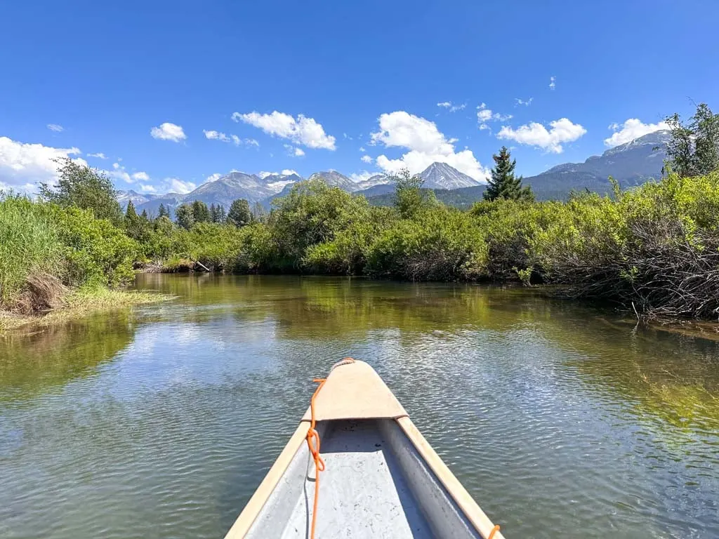 View of the mountains from a canoe in Whistler