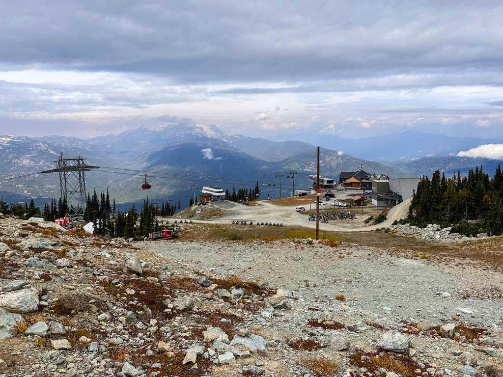 Rendezous Lodge and the Peak 2 Peak Gondola on Blackcomb seen from the alpine trails up the hill 